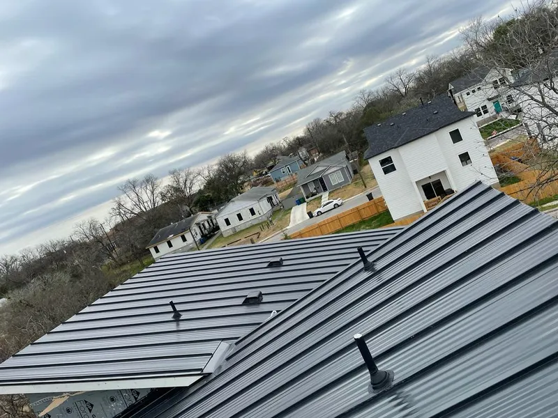 Standing seam metal roof panels with vents for Skylight Repair in Toledo
